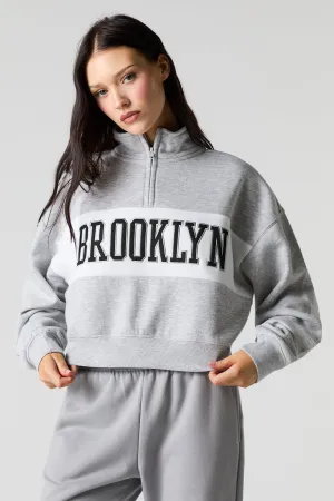 Chandail en molleton à glissière un quart et broderie City Twill